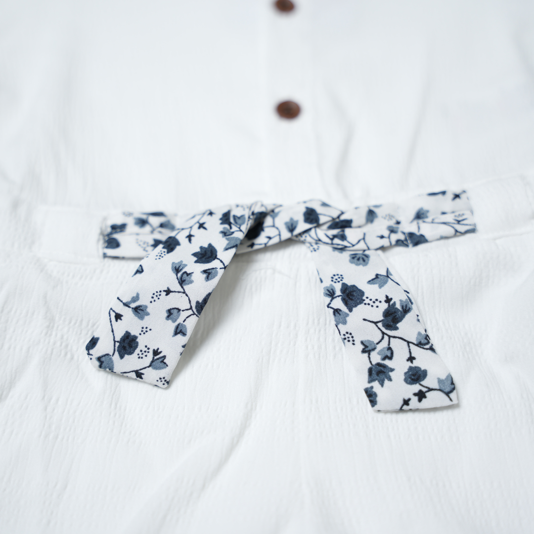 Crisp White Cotton Textured Romper with Floral Print Belt
