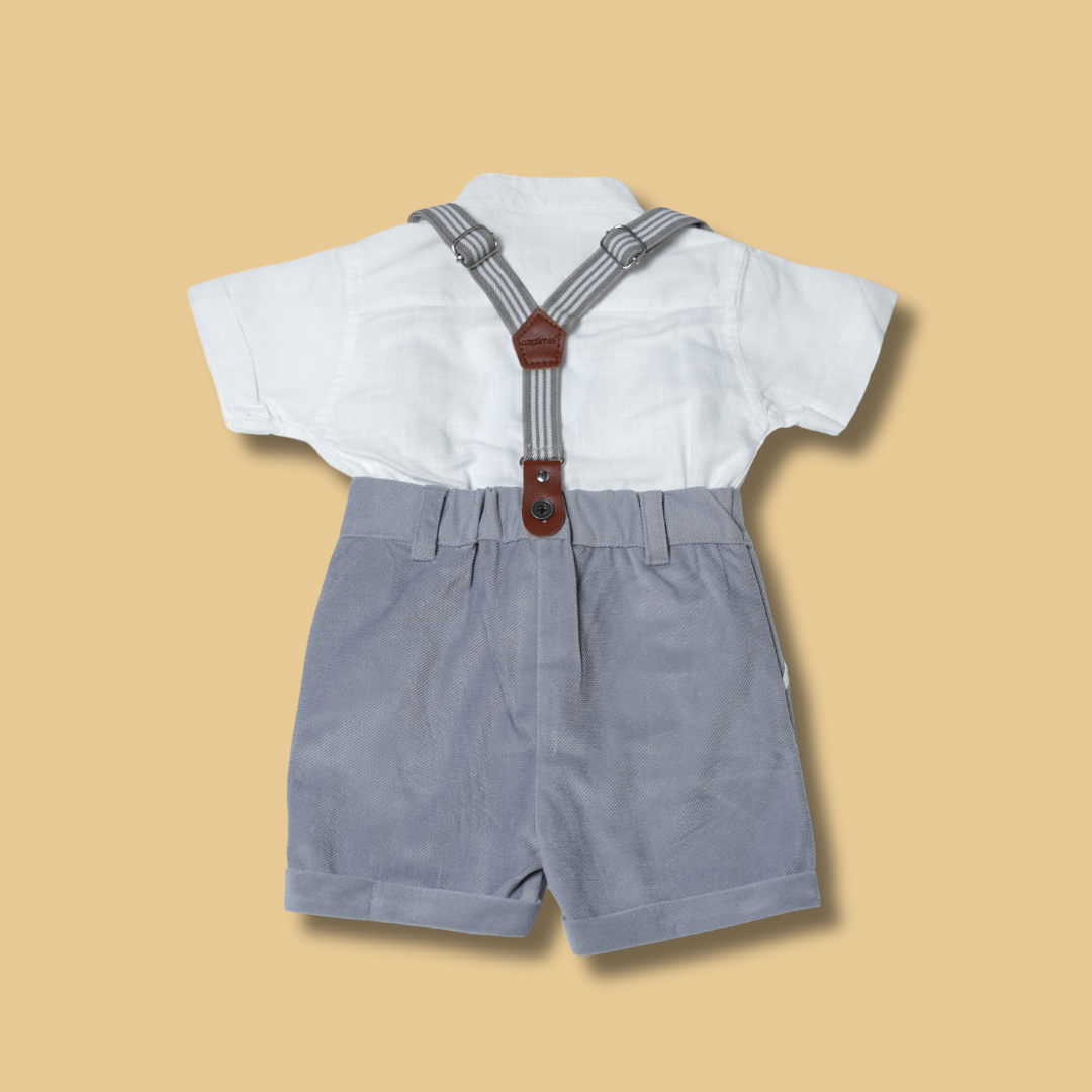 boys white collared shirt with gray shorts and classic suspenders outfit