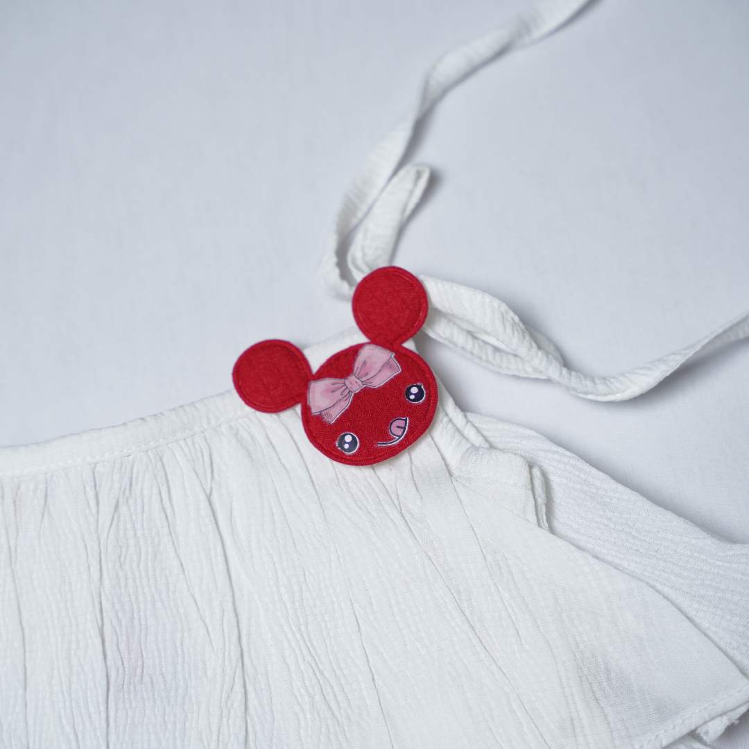 white cotton tiered dress with red Mickey Mouse accent
