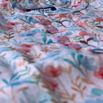 Close-up of a floral-patterned shirt with a blurred background