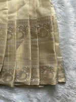 Folded fabric with intricate patterns on a textured surface
